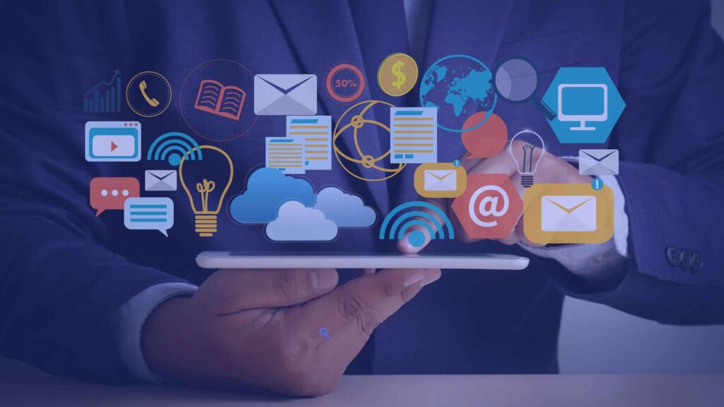 Man holding a tablet that demonstrates icons of strategies used for a digital marketing campaign.